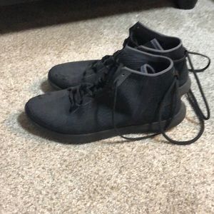 Woman’s black yoga under armor shoes